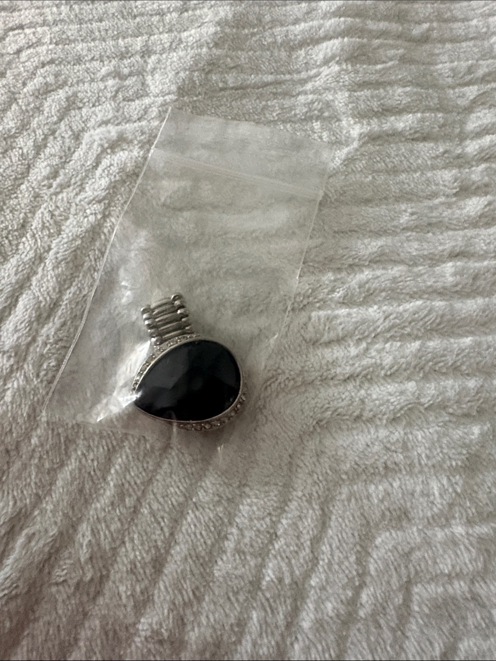Silver Tone Ring with Black Oval Stone
